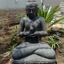 Large hand-carved stone Buddha statue