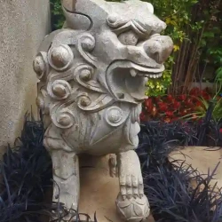 Solid granite hand-carved temple lion / Fu dog / Foo dog (left of a pair)