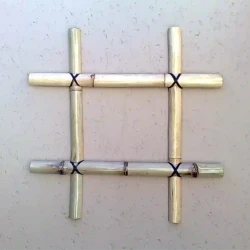 Ornamental bamboo cross-hatch on wall, traditional knots